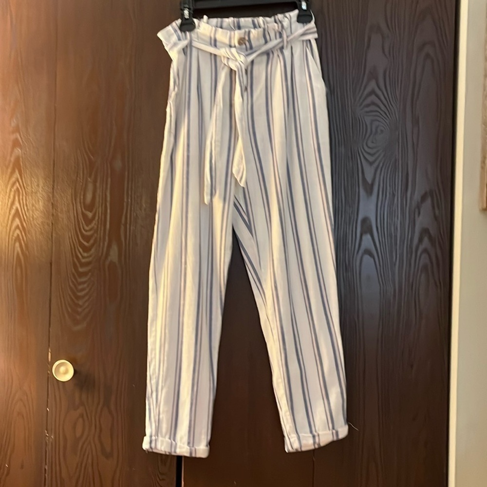 Hot Kiss 100% cotton but have a linen appearance pants. Size 5